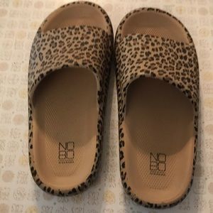 Women’s size 7 slip on sandals, never worn